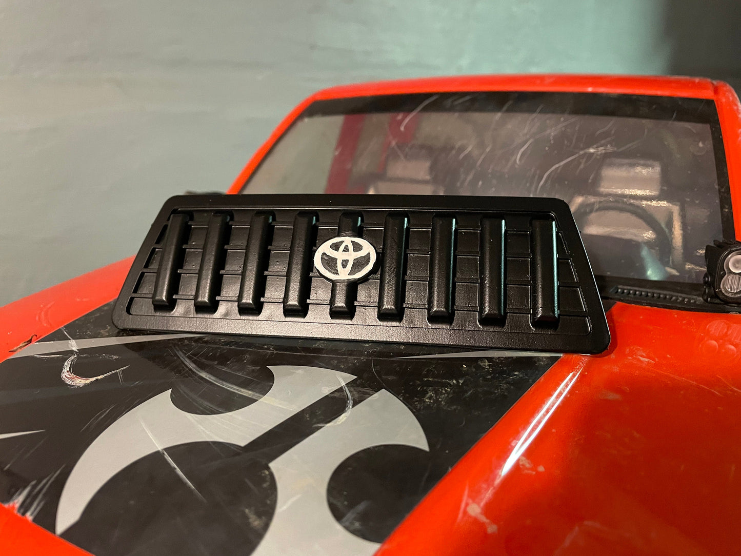 Honcho Older Toyota Style Front Grill - Updated w/ Logo Spot! - Unpainted for SCX6